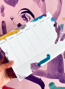 detail of colorful weekly planner with brush pen pattern