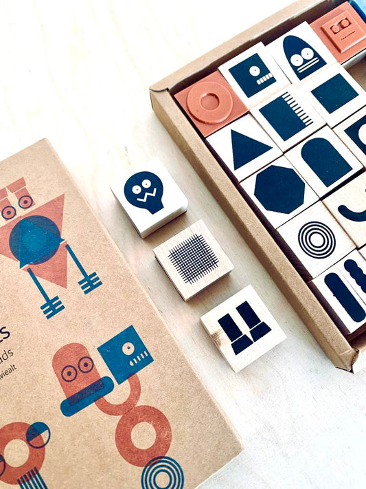 side view of wood-backed robot stamps