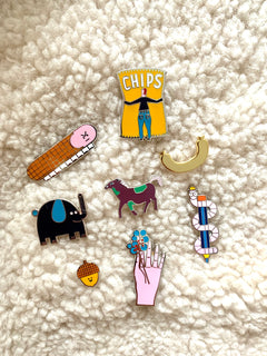 collection of fun enamel pins