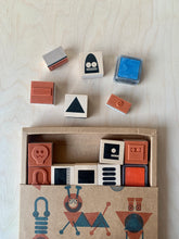 Load image into Gallery viewer, detail of 28 individual wood-backed robot stamps 